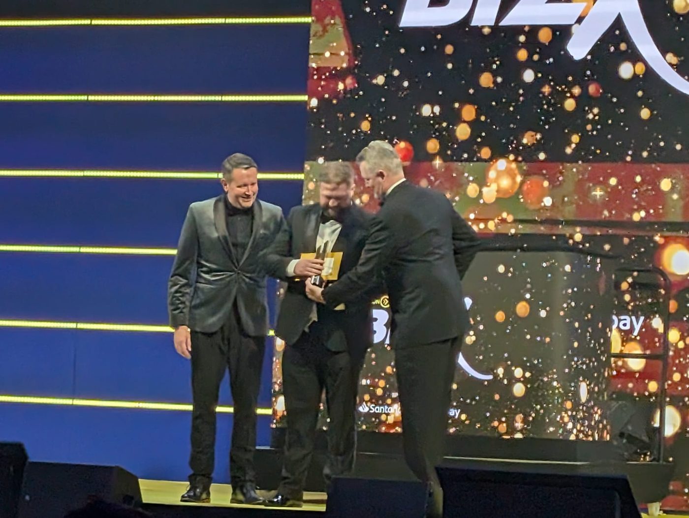 Elliot Tierney on stage at the BizX Awards