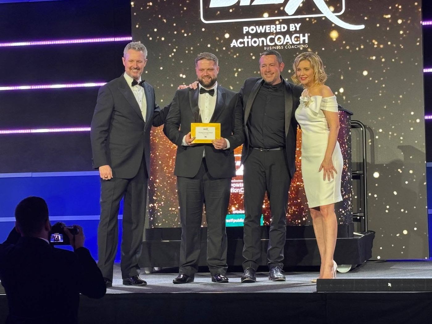 Elliot Tierney collecting Young Entrepreneur of the Year at the BizX Awards 2025
